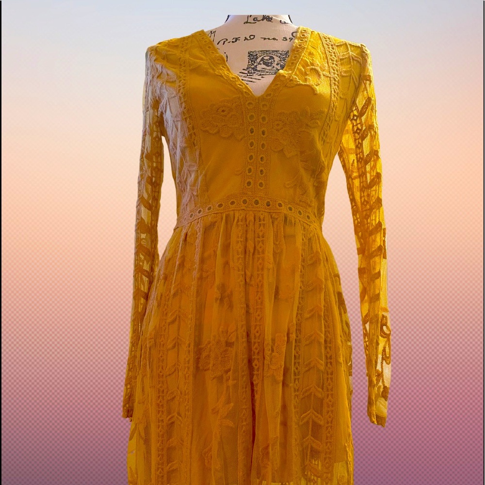 This is a beautifully designed long sleeve sleek dress.